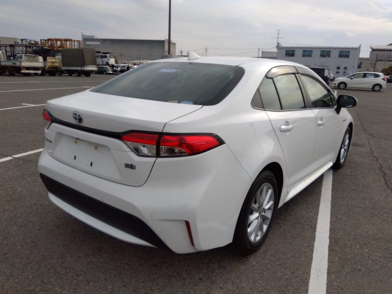Toyota Corolla S 2020 (Hybrid, Auction Grade 4.5) – White | 49,960 km | ECB Showroom | STK-250018